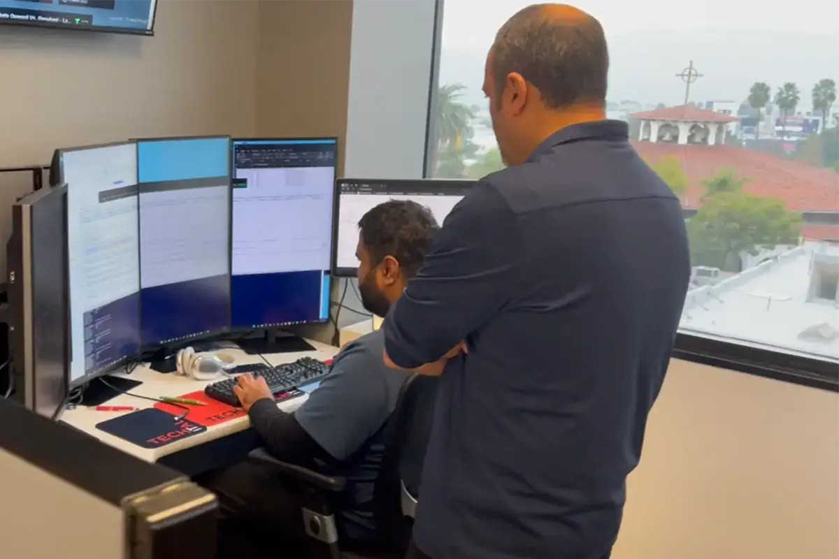 Techital engineers collaborating on an IT support issue in Frisco